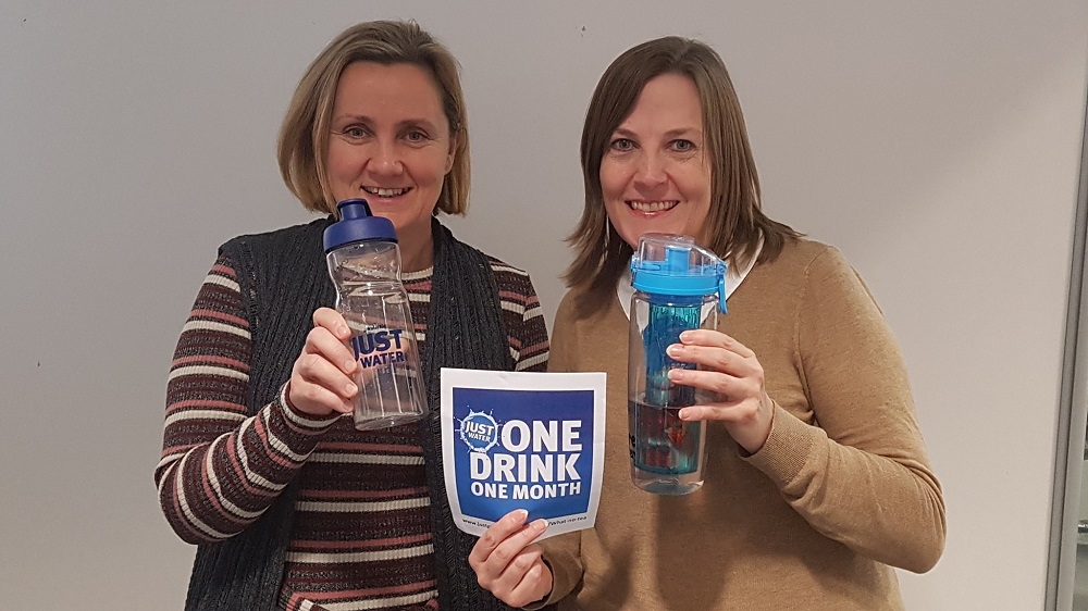 Elinor and Christine holding their water bottles